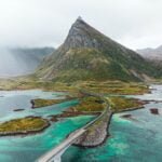 norwegian mountain with rain cloud next to it